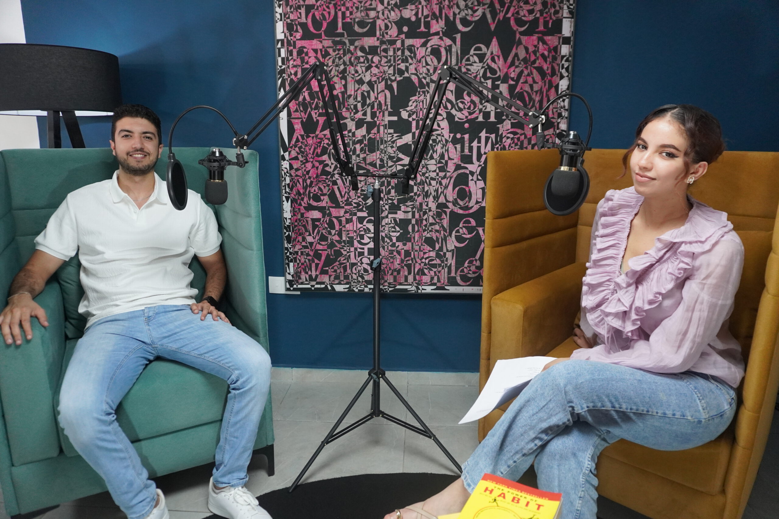 Podcast hosts in conversation
